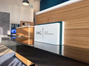a counter with a box on top of it at Holiday Inn Express - Ankara - Airport by IHG in Ankara