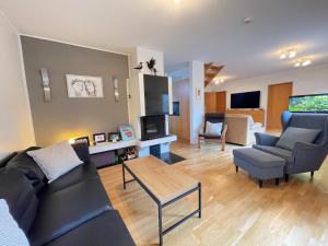 Zona d'estar a Cosy and family friendly house in Reykjavik centrally located in Laugardalur