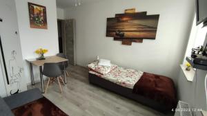 Posteľ alebo postele v izbe v ubytovaní Apartament "Jeleń" Jelenia Góra - Cieplice