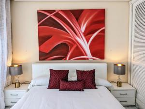 Posteľ alebo postele v izbe v ubytovaní Marina Mariola by Coral Beach