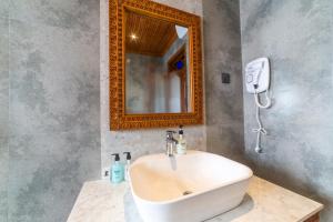 Ванная комната в Tembo House Hotel