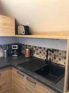 Kuchyňa alebo kuchynka v ubytovaní Apartmán 430