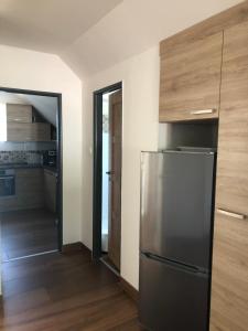Kuchyňa alebo kuchynka v ubytovaní Apartmán 430