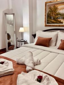 Кровать или кровати в номере Athéna Getaway