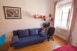 Televízia a/alebo spoločenská miestnosť v ubytovaní Apartments Lina - Center with free parking!