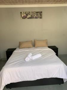 Ένα ή περισσότερα κρεβάτια σε δωμάτιο στο northmead lodge
