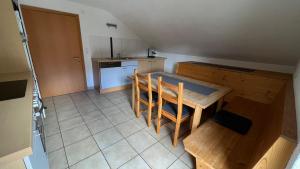 Kuchyň nebo kuchyňský kout v ubytování Apart Urban