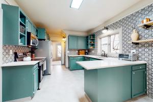 Η κουζίνα ή μικρή κουζίνα στο Tacoma Garden Hideaway +16 φωτογραφίες