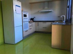 Kuchyň nebo kuchyňský kout v ubytování Casa MARINA