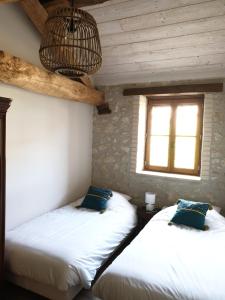 Postel nebo postele na pokoji v ubytování Gite La Halippe + 29 fotografií