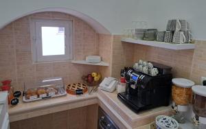 Kuchyň nebo kuchyňský kout v ubytování B&B Casa Denittis