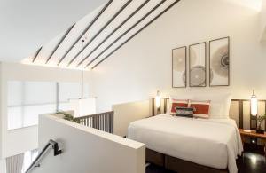 Aleenta Retreat Chiang Mai - The Leading Hotels of the World客房内的一张或多张床位