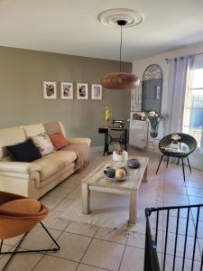 Χώρος καθιστικού στο chambre d'hôte chez Mimidid