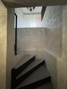 a staircase in a room with a stair case at Casa Rania in Sibiu