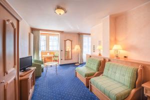 Posezení v ubytování Hotel Relais Orsingher