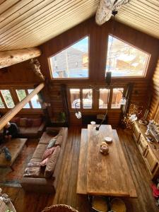 an overhead view of a living room in a log cabin at Chalet Shaimoa in Font-Romeu-Odeillo-Via