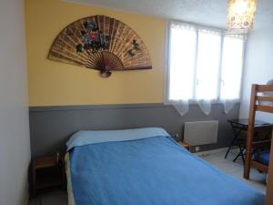 Posteľ alebo postele v izbe v ubytovaní APPARTEMENT T2 LES BECS RDC