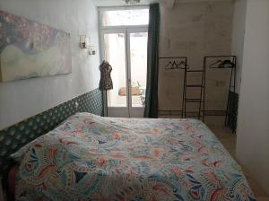 Posteľ alebo postele v izbe v ubytovaní Maison intra muros, terrasses avec vue jaccuzzi et garage