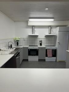 Kuchyň nebo kuchyňský kout v ubytování Traume vandrarhem