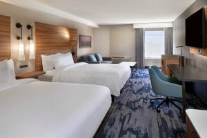 Cama o camas de una habitación en Fairfield by Marriott Niagara Falls, Canada