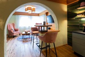 Televízia a/alebo spoločenská miestnosť v ubytovaní Wellness Aparthotel "Lechlife" incl Pool - 400m zum LIFT