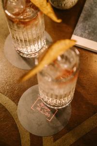 a drink in a glass on a table at Paragon 700 Boutique Hotel & SPA in Ostuni