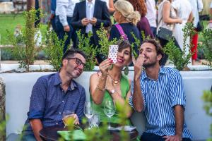 a group of three people sitting at a table at Paragon 700 Boutique Hotel & SPA in Ostuni