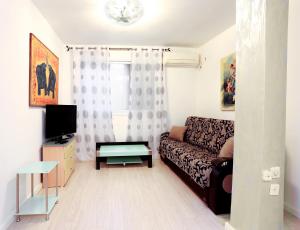 Μια τηλεόραση ή/και κέντρο ψυχαγωγίας στο Apartments Petah Tiqwa