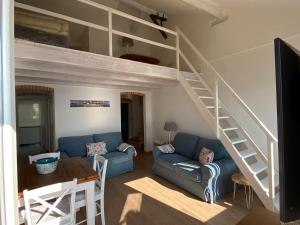 A seating area at Attico Fronte Mare nel Borgo di Celle Ligure