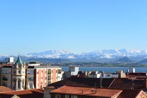 a view of a city with mountains in the background at Hotel Art Santander - Adults Only in Santander