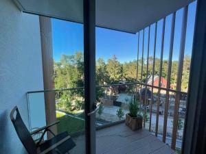 En balkon eller terrasse på Apartamenty Pobierowo Pinea MAX