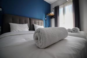 A bed or beds in a room at LA CASA DE PROFESOR 1