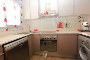 Kuchyň nebo kuchyňský kout v ubytování Vacaciones Cambrils sol Park