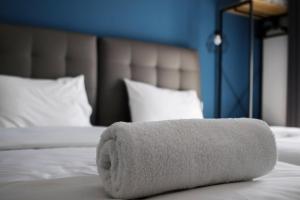 A bed or beds in a room at LA CASA DE PROFESOR 1