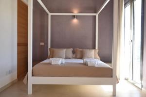 A bed or beds in a room at Torre Difyos