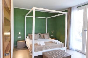 A bed or beds in a room at Torre Difyos