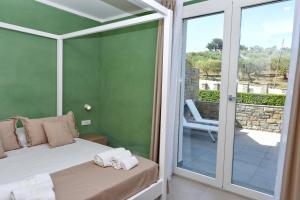 A bed or beds in a room at Torre Difyos