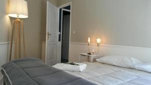 Posteľ alebo postele v izbe v ubytovaní Centre d'Aix - charmant appartement 1 chambre Pythagore avec parking