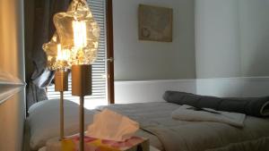 Posteľ alebo postele v izbe v ubytovaní Centre d'Aix - charmant appartement 1 chambre Pythagore avec parking