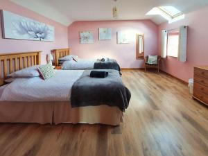 Postel nebo postele na pokoji v ubytování The Granary- Osc