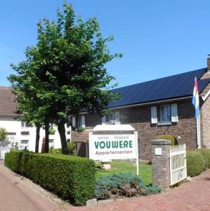 メッヘレンにあるAppartementen Vouwereの家の前の看板
