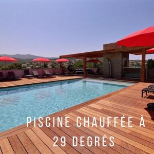 a picture of a swimming pool with the words passive chumpre a degrees at Residence ACQUA LINDA Porticcio in Porticcio