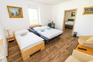 Postel nebo postele na pokoji v ubytování Vila Eva Lesce - Bled