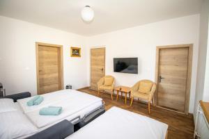 Postel nebo postele na pokoji v ubytování Vila Eva Lesce - Bled