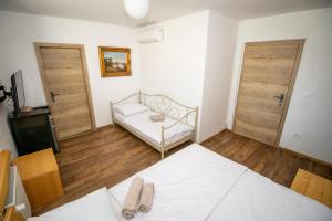Postel nebo postele na pokoji v ubytování Vila Eva Lesce - Bled