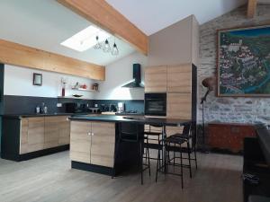 Kuchyň nebo kuchyňský kout v ubytování Loft vue montagne