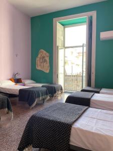 Ένα ή περισσότερα κρεβάτια σε δωμάτιο στο 6 Small Rooms