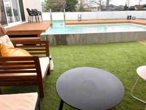 Bazén v ubytování Sunshine pool villa プライベートヴィラ新筑カリフォルニアスタイル 九十九里 nebo v jeho okolí