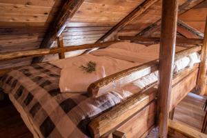 Postel nebo postele na pokoji v ubytování Chute Lake Lodge