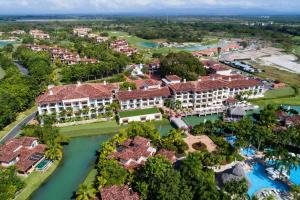 an aerial view of the resort and the river at The Buenaventura Golf & Beach Resort, Autograph Collection in Río Hato